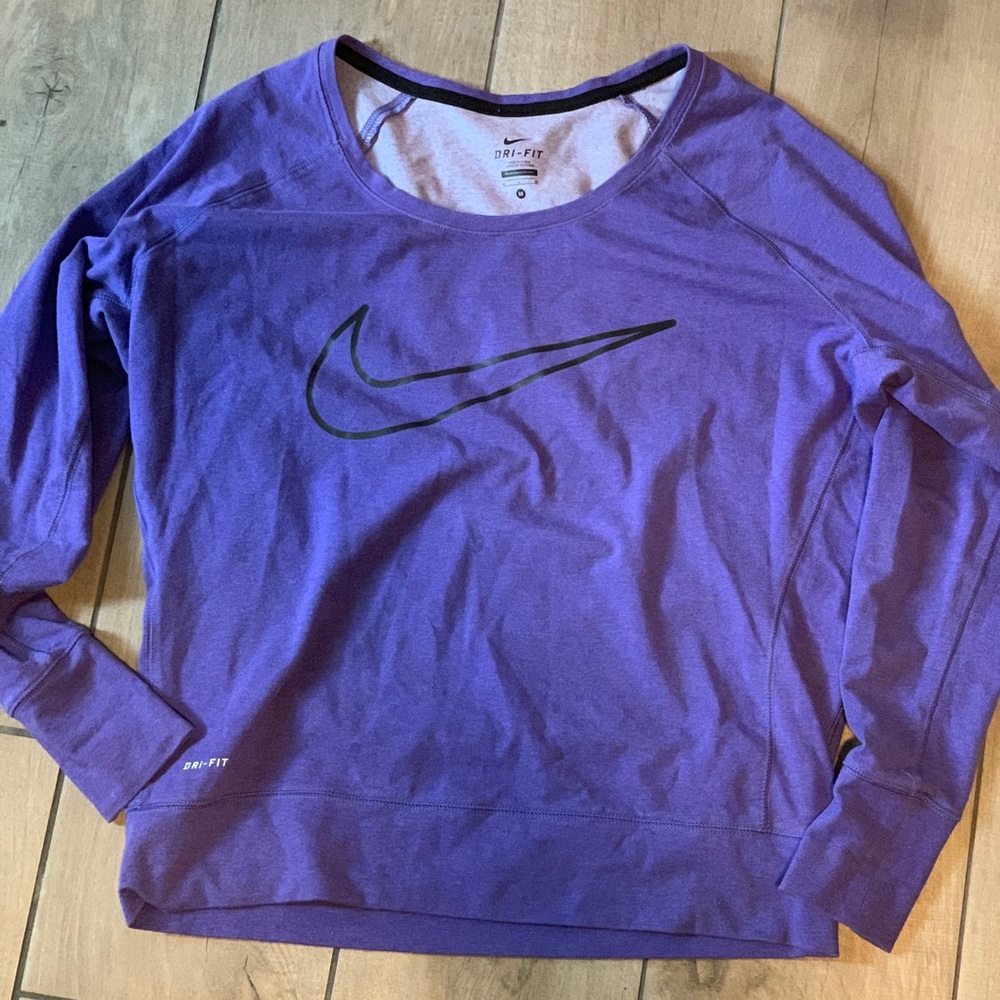 Nike dri-fit sweatshirt.  Very soft and stretchy